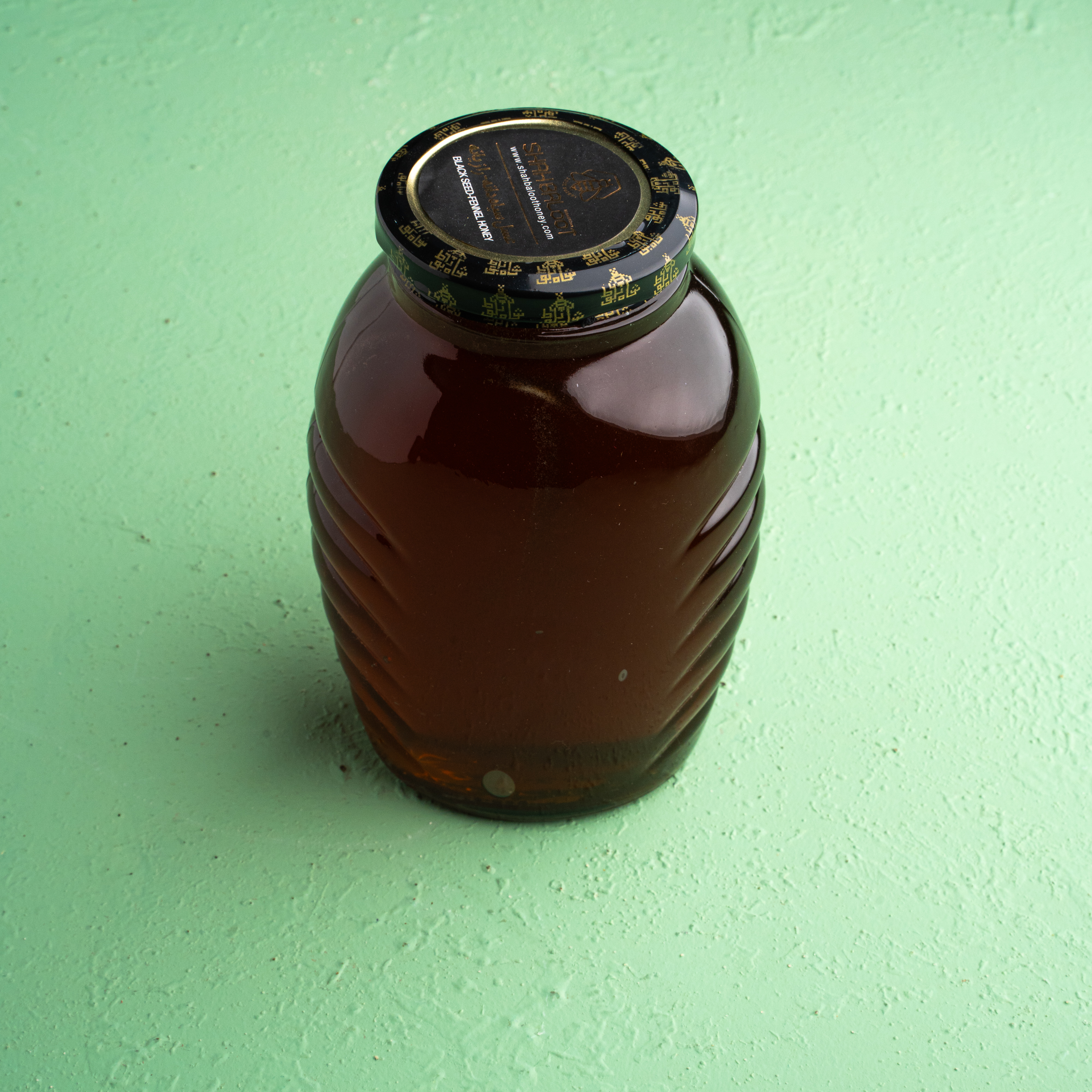 عسل سياه دانه يک کيلويی شاه بلوط